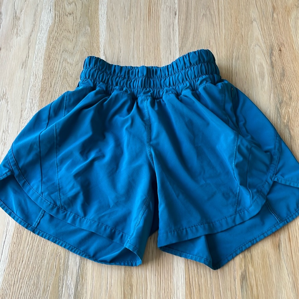 Women’s Lululemon turquoise blue running shorts. Gently worn, size 2, 5” inseam